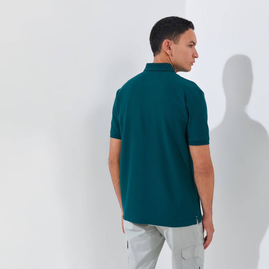 Jack Nicklaus Corbin Polo Shirt Pria Regular Fit Atlantic Deep - Image 4